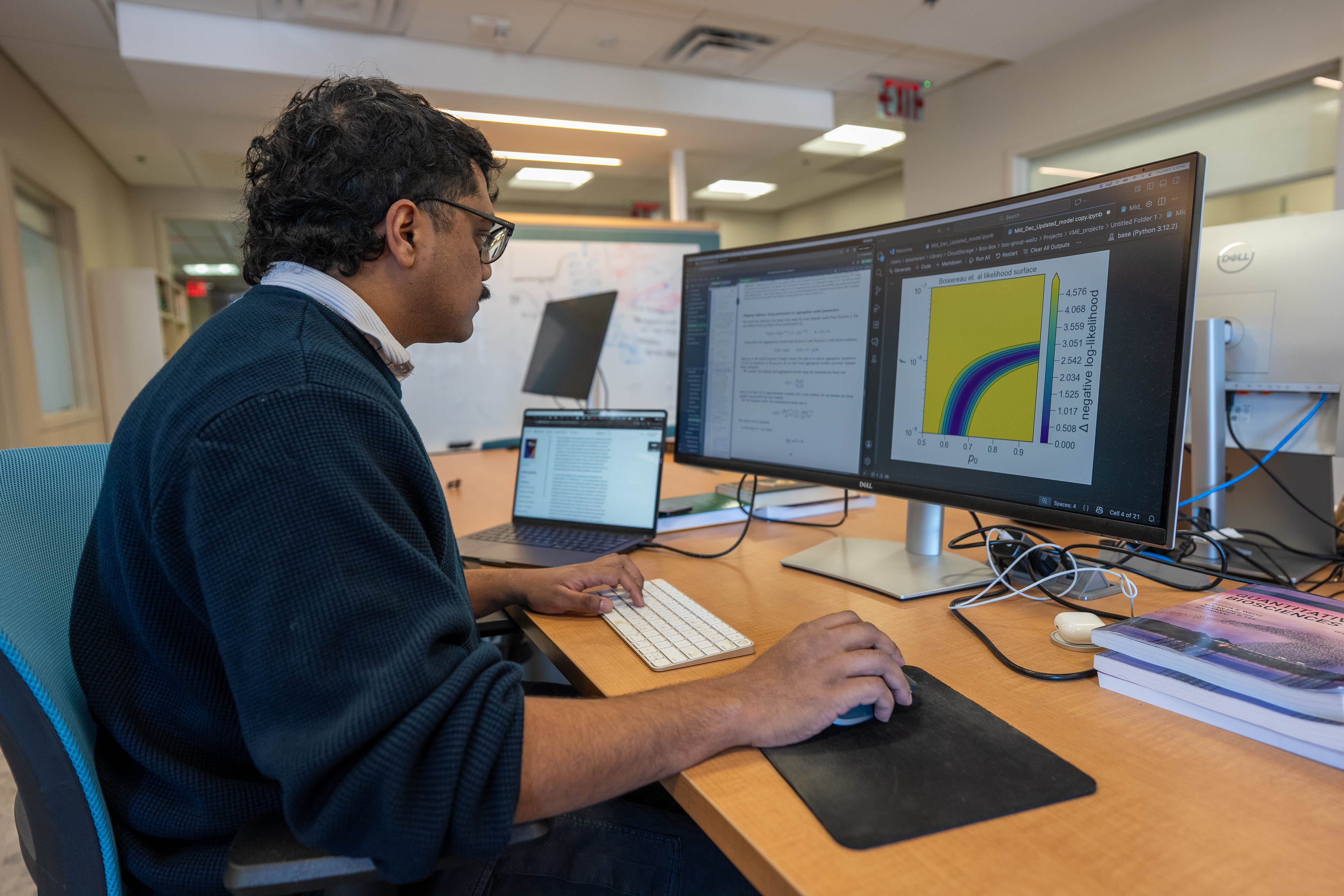 Akash Arani working at a computer