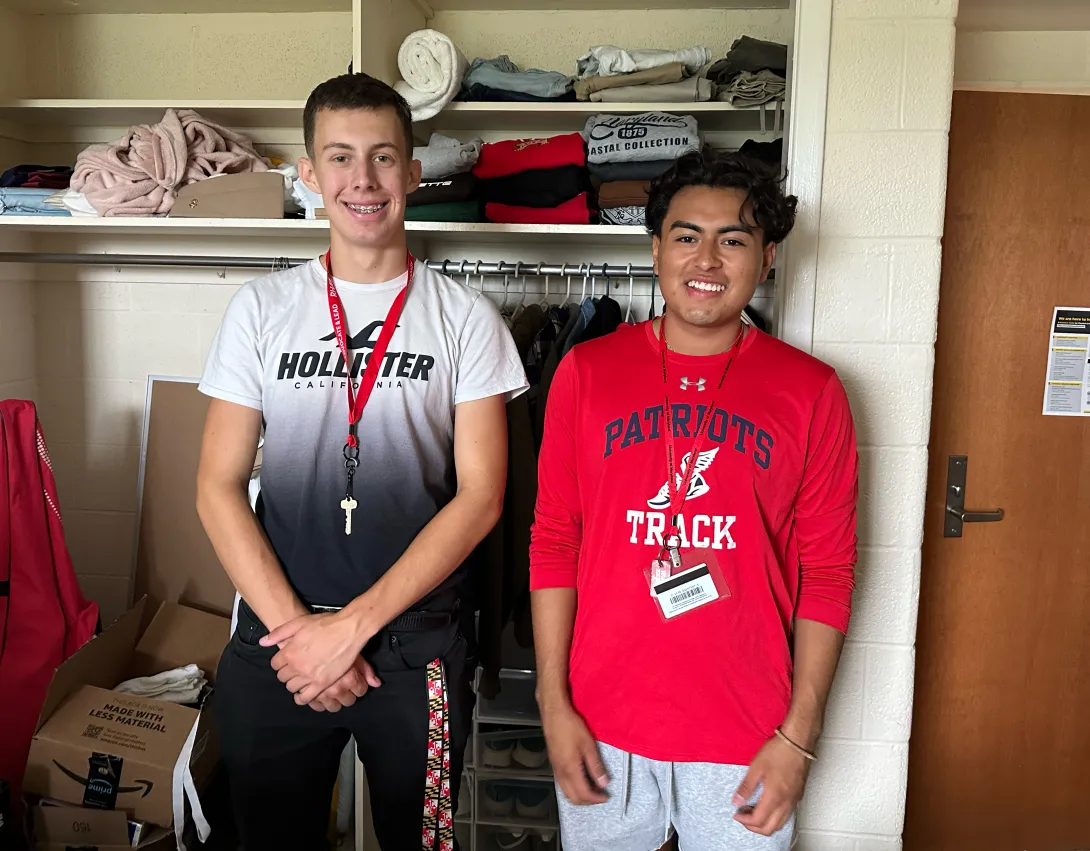 BioFIRE roommates standing in their room in Easton Hall