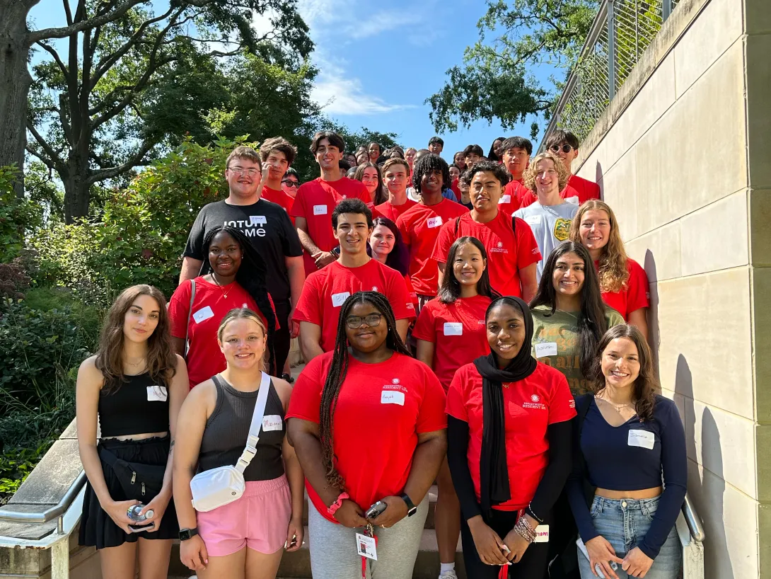 BioFIRE students stand on steps for group photo.